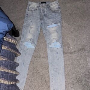 AMIRI Light Blue Denim with Black Leather Patch
